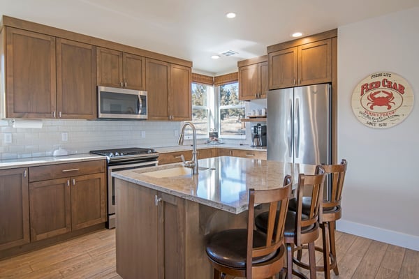 Kitchen Stove, Microwave, Sink and Breakfast Bar