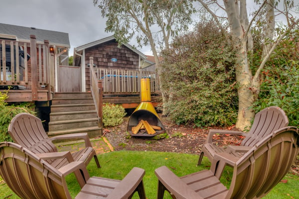 Backyard seating by a Fire stove