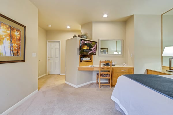 Bedroom with TV and Desk