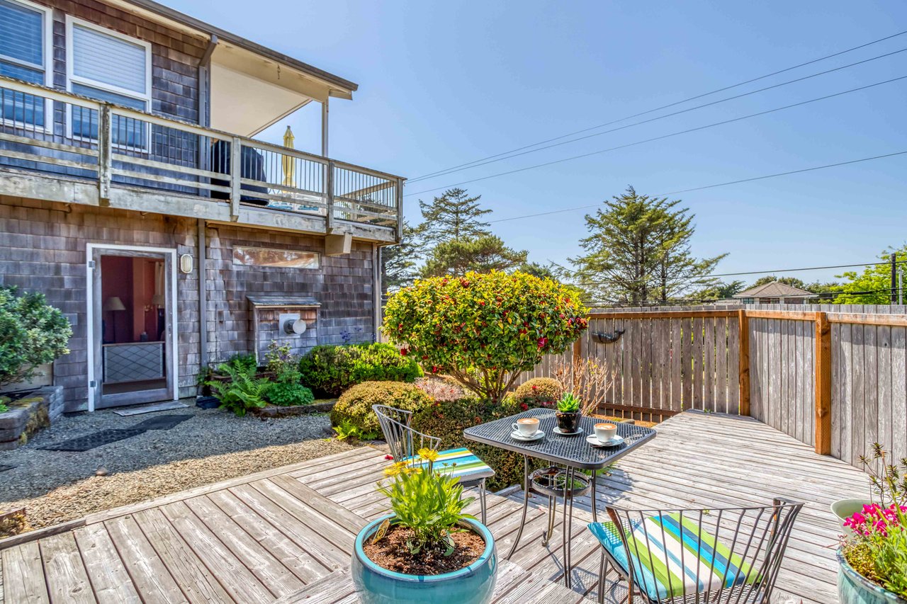 Side Yard with seating and a Deck