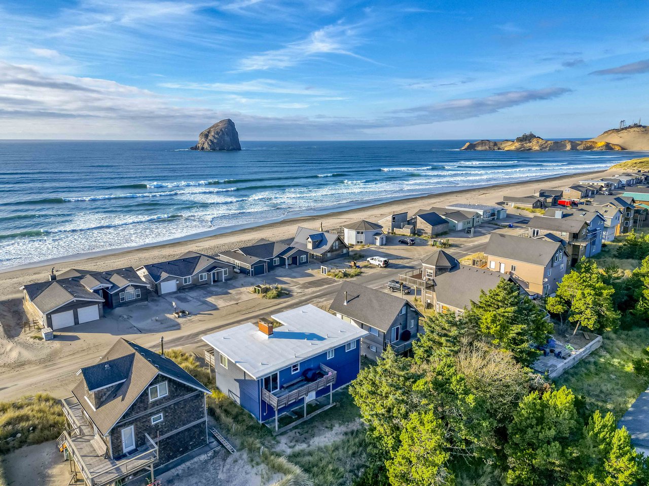 Aerial view of the property facing the beach and the rock