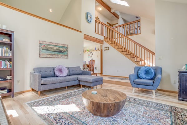 Living room area with stairway