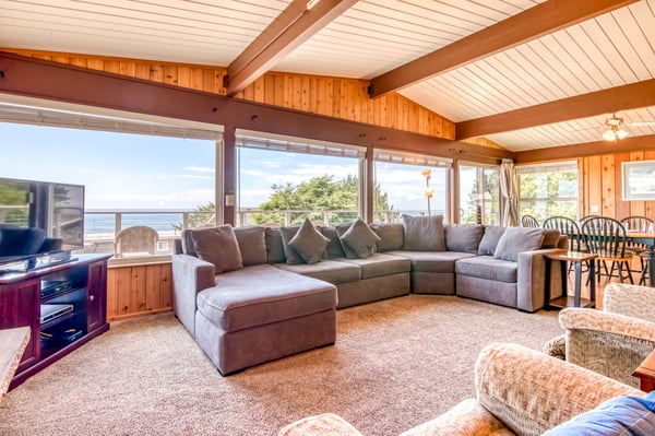 Living Room with huge windows and beach view