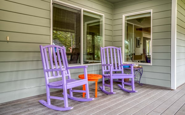 Gaze out on the estuary from rocking chairs on the deck