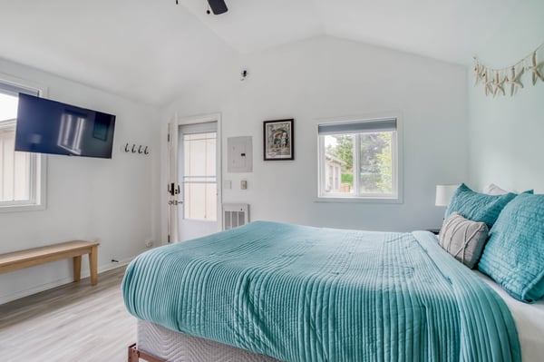 Comfortable bed with window views